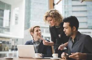 intern-e1493821365759-300x196 Multiracial business people working outdoor in town
