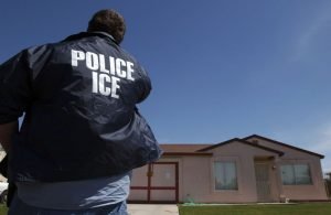 1493336761_100757011iceb042817-300x195 An Immigration and Customs Enforcement officer outside a home where a tunnel under the border was recently found, in Calexico, Calif.