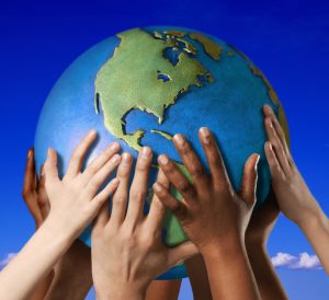 Earth-Day-2011-e1523541131799-300x274 Hands on a globe