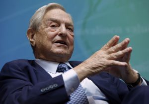 RTR2RSIQ-300x209 Billionaire investor Soros speaks at a forum during the annual IMF-World Bank meetings in Washington
