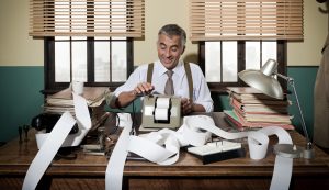 a-guide-to-finding-the-right-accountant-e1529422897876-300x173 Busy Vintage Accountant With Calculator