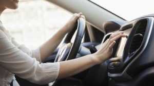 https_2F2Fstatic.makers.com2Ffield2Fimage2FDriver-300x169 Caucasian woman using GPS system in car