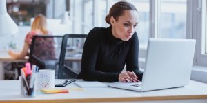 Job-Search-Myths-Debunked-300x150 Young Business Executive Using Laptop