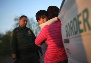 migrants-2-300x208 migrants-2