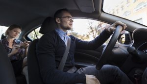 Tax-Tips-for-Uber-Drivers-300x173 Man driving with woman sitting in car