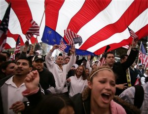 PR_Recapture-the-flag_marching-under-a-flag-300x230 IMMIGRATION BOYCOTT DAY