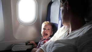 9AD07A6B-EF34-45DF-A95A-97E11B5B42F0-300x169 Boy crying on a plane