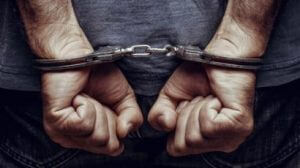 handcuffed1-300x168 handcuffed1