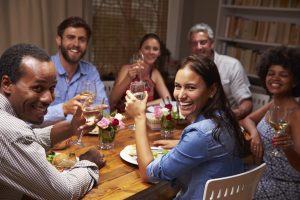 iStock_000068883259_Medium-300x200 Friends at an evening dinner party, looking at camera