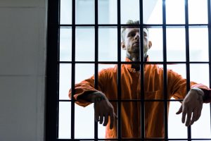 prisoner-putting-hands-between-prison-bars-2021-08-29-21-23-37-utc-300x200 prisoner putting hands between prison bars